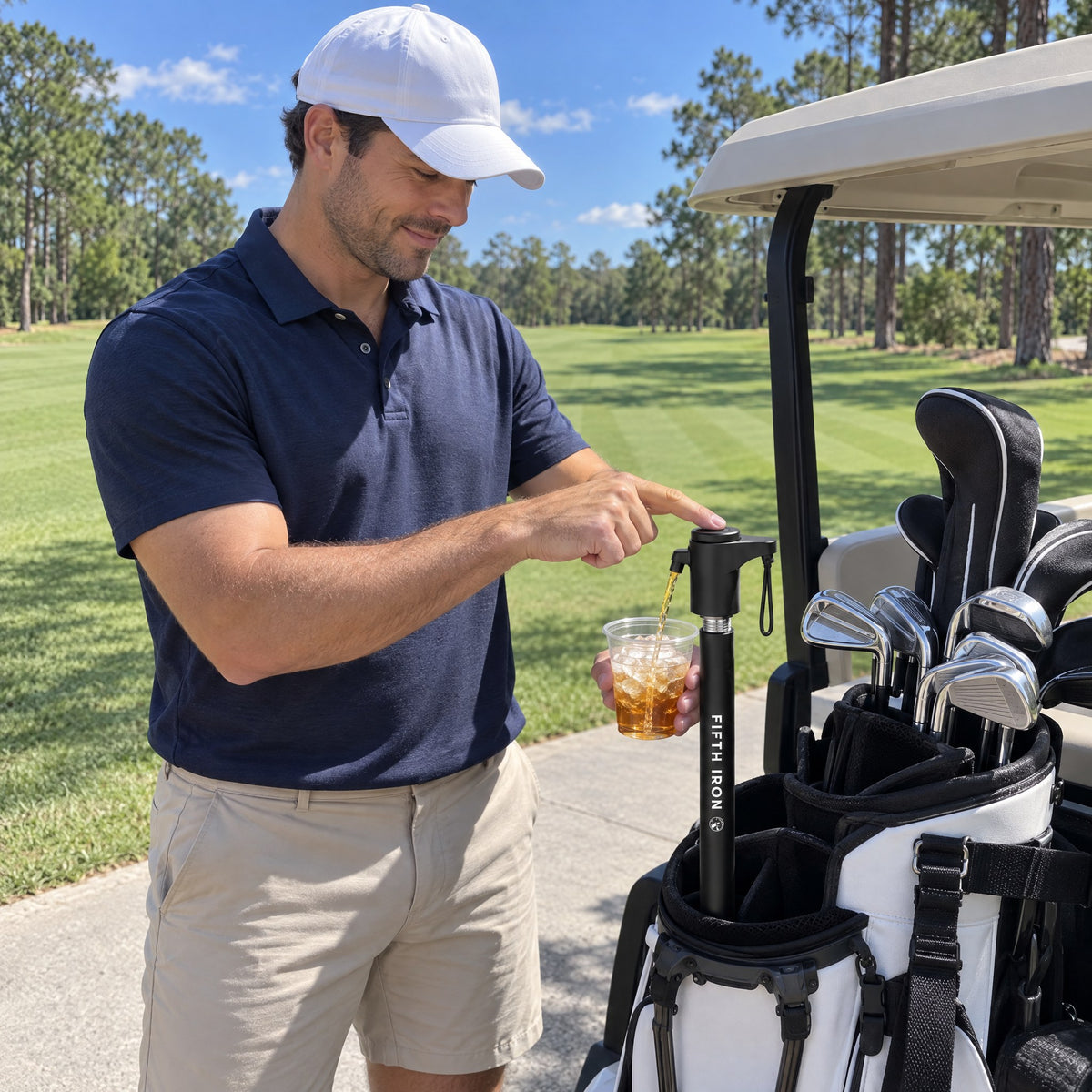 Golfer pouring a drink from a FIFTH IRON in his golf bag
