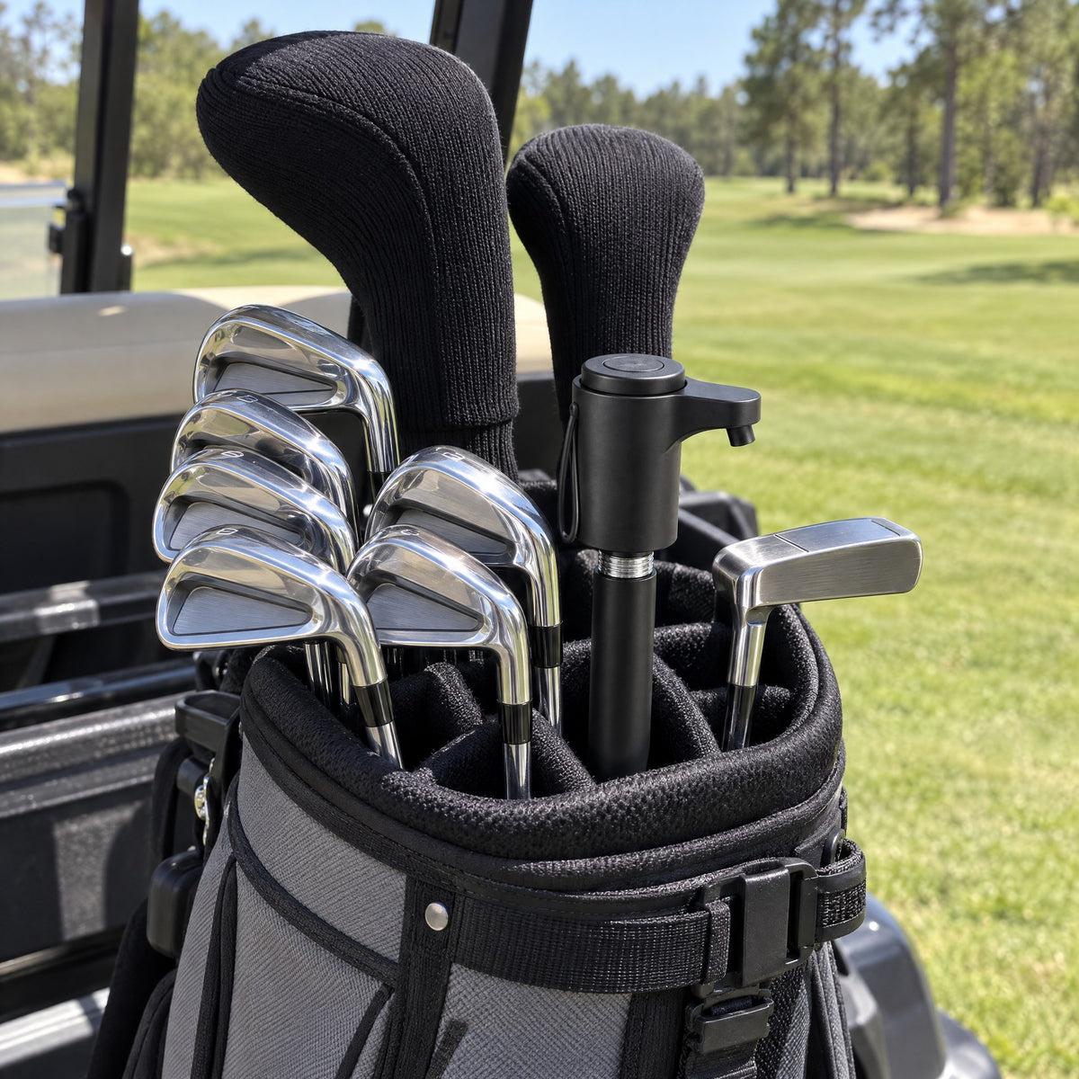 Club-shaped drink dispenser stored inside a golf bag